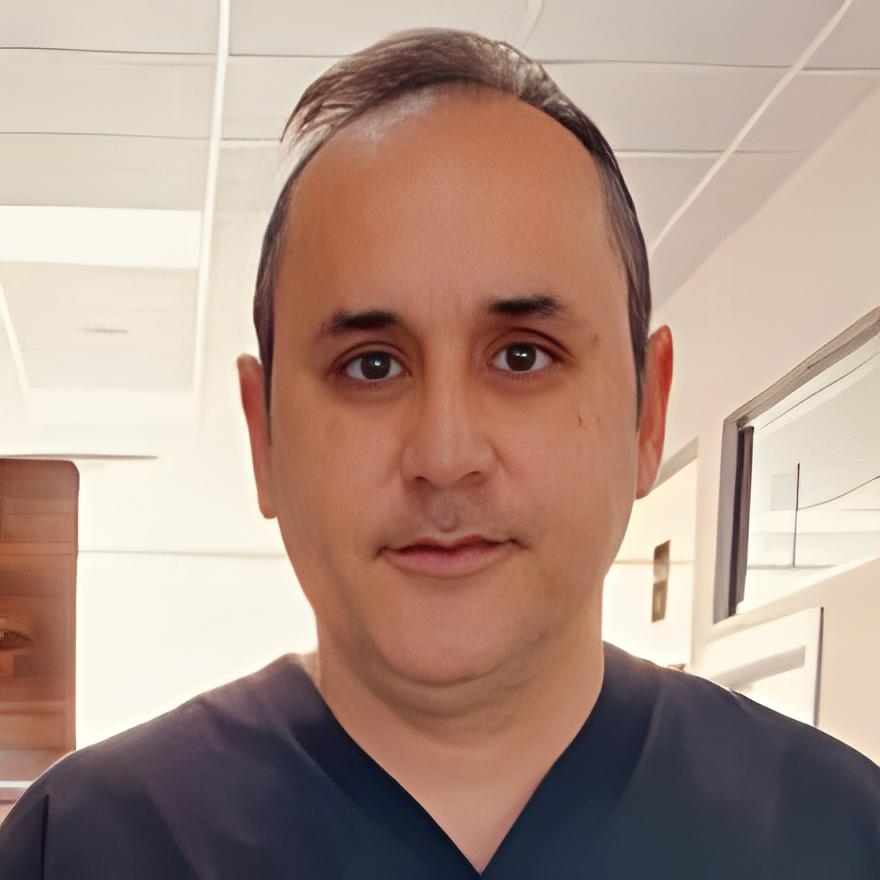 Dr. Yigit Tezol